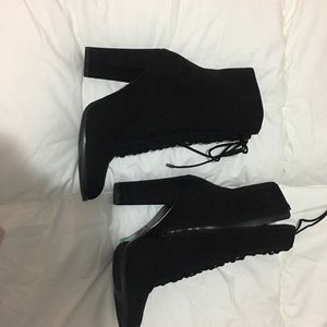 Laced up black boots
